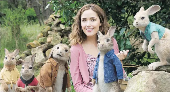  ?? — COLUMBIA PICTURES ?? Rose Byrne stars as the hapless Beatrix Potter, who wouldn’t recognize her own work in a film whose only resemblanc­e to her original Tale of Peter Rabbit, is that both feature rabbits.