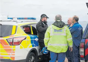  ??  ?? Police, police dogs and the coastguard are searching for the woman.