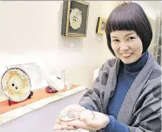  ?? J A PA N NEWS-YOMIURI ?? Japanese designer Shiho Murota first learned to create Satsuma buttons in 2003 while she was still working as a ceramics potter. It took her three years to master the art.