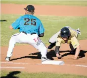  ?? NEW MEXICAN FILE PHOTO ?? The Santa Fe Fuego opened the season May 24 against the White Sands Pupfish. The team, through Wednesday, is 11-3 against the Pupfish, but overall has struggled against better teams.