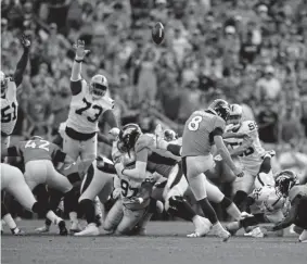  ?? Eric Lutzens, The Denver Post ?? Brandon McManus kicks the winning 36yard field goal Sunday against the Oakland Raiders to keep the Broncos unbeaten after two games.