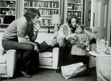  ??  ?? Larkin with his parents, Dame Maggie Smith and the late Sir Robert Stephens, in 1970