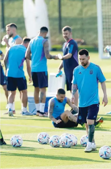  ?? Agence France-presse ?? Lionel Messi takes part in a training session in Doha on Monday.