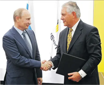  ?? MIKHAIL KLIMENTYEV/THE ASSOCIATED PRESS ?? Russian President Vladimir Putin and ExxonMobil CEO Rex Tillerson shake hands at a signing ceremony of a deal between state-controlled Russian oil company Rosneft and ExxonMobil at the Black Sea port of Tuapse in southern Russia in 2012.