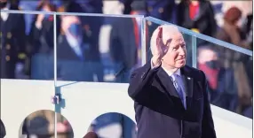  ?? Tasos Katopodis / Associated Press ?? President Joe Biden waves as he prepares to deliver his inaugural address on the West Front of the U.S. Capitol in Washington on Wednesday.