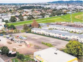  ??  ?? An elevated view of the 2.472ha subdivisio­n site at 194 Mahia Rd ( left); the big vacant site for sale at 1909 Great North Rd.