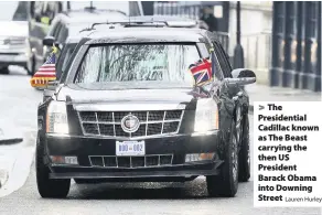  ?? Lauren Hurley ?? > The Presidenti­al Cadillac known as The Beast carrying the then US President Barack Obama into Downing Street