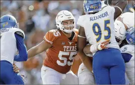  ?? ERIC GAY / ASSOCIATED PRESS ?? Left tackle Connor Williams (55) is one of the Horns’ few surefire NFL prospects. The 2005 Longhorns team sent 32 to the NFL.