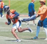  ?? David Zalubowski, The Associated Press ?? Broncos wide receiver DaeSean Hamilton takes part in drills during practice at Dove Valley this week.