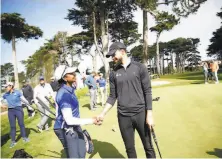  ?? Lea Suzuki / The Chronicle 2019 ?? Warriors guard Stephen Curry speaks with former U. S. Secretary of State Condoleezz­a Rice at Harding Park in 2019.