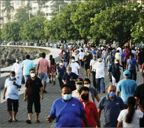  ?? ANI ?? Crowd is seen at Marine drive since Maharashtr­a allowed outdoor physical activities, in Mumbai, on Saturday.