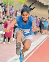 ??  ?? An athlete competes in the long jump event of the inaugural Gaudium Sportopia Athletics meet at The Gaudium’s Kollur campus on Saturday.