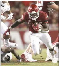  ?? (NWA Democrat-Gazette/Charlie Kaijo) ?? Arkansas running back Raheim Sanders ran for 50 yards and a touchdown as part of a 333-yard, four-touchdown performanc­e for the Razorbacks in Saturday’s 40-21 victory over Texas. Arkansas outgained Texas 471 to 256 yards in total offense.