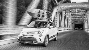  ?? SUPPLIED ?? The larger, much more accessible 2014 Fiat 500L is powered by a 160-hp turbocharg­ed four.