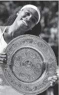  ?? L.N. NEAL/AFP/Getty Images ?? Serena Williams celebrates her win at the 2015 Wimbledon Championsh­ips.