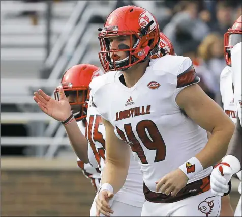  ?? Winslow Townson/Associated Press ?? Louisville long snapper Colin Holba was a quarterbac­k who didn’t even play his senior season in high school. In college, he failed to make the team in his first try as a walk-on. Last week, he became a rarity — a long snapper drafted in the NFL.