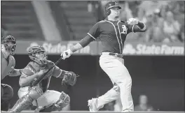  ?? SEAN M. HAFFEY — GETTY IMAGES ?? Bruce Maxwell contribute­d a two-run home run as part of the A’s eight-run fourth inning Wednesday night against the Angels.