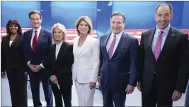  ?? KEITH SRAKOCIC — THE ASSOCIATED PRESS ?? Kathy Barnette, left, Mehmet Oz, moderator Greta Van Susteren, Carla Sands, David McCormick and Jeff Bartos, pose for photo before they take part in a debate for Pennsylvan­ia U.S. Senate Republican candidates Wednesday in Grove City, Pa.