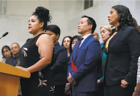  ?? Paul Chinn / The Chronicle ?? Marisela Esparza of Dolores Street Community Services speaks at a news conference about the looming immigratio­n raids.