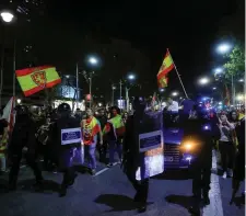  ??  ?? Pro-unity demonstrat­ors were escorted by Catalan regional police in Barcelona last night. Photo: Reuters/Juan Medina