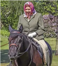  ??  ?? The Queen has been photograph­ed riding in the grounds of Windsor Castle - the first time she has been seen outside since the coronaviru­s lockdown began.