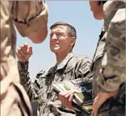  ?? Carolyn Cole Los Angeles Times ?? OUSTED national security advisor Michael Flynn pictured in 2009 as director of Army intelligen­ce in Afghanista­n. This isn’t his first brush with the law.