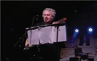  ?? PETER BLACKSTOCK / AMERICAN-STATESMAN ?? Daniel Johnston performs during “Hi, How Are You?” Day at the Mohawk on Monday. Johnston hadn’t been formally announced as a musical participan­t, but he returned at the end of the event to close things out.
