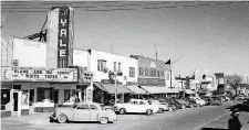  ?? [PHOTO PROVIDED
BY THE OKLAHOMA HISTORICAL SOCIETY] ?? TOP LEFT: The Yale Theater, shown in this 1951 photograph, was one of a handful of cinemas in what was a thriving Capitol Hill business corridor along SW 25 (also known as Commerce Street) through the 1970s.