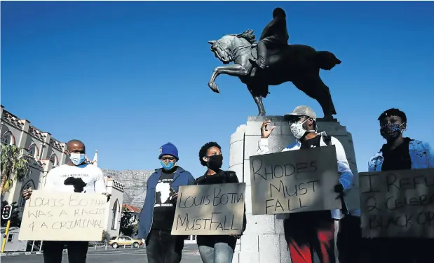  ?? Picture: Esa Alexander ?? HIGH HORSE Members of the Black People’s National Crisis Committee protest in front of parliament for the removal of a statue of Louis Botha, first prime minister of the Union of SA.