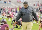  ?? Ken Murray/Icon Sportswire via Getty Images ?? Interim Aggies coach Elijah Robinson is leaving to be Syracuse’s defensive coordinato­r after the bowl game.