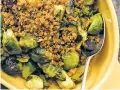  ?? SARAH CROWDER VIA AP ?? Pan-roasted Brussels sprouts with chorizo and toasted bread crumbs.