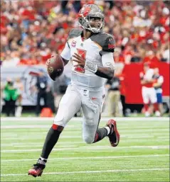  ?? Kevin C. Cox Getty Images ?? JAMEIS WINSTON of Tampa Bay threw four touchdown passes in an opening win over Atlanta in 2016, but the Falcons won the NFC.