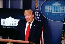  ?? ASSOCIATED PRESS ?? PRESIDENT DONALD TRUMP SPEAKS with reporters about the coronaviru­s in the James Brady Briefing Room of the White House in Washington on Friday.