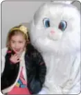  ??  ?? Caitlyn Reilly, 3, visits with the Easter Bunny.