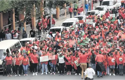  ?? Picture: Nigel Sibanda ?? UNIONS PANIC. Cosatu and its affiliates’ members march to the Gauteng Legislatur­e in Johannesbu­rg yesterday during a one-day nationwide strike against job losses and the restructur­ing of Eskom.