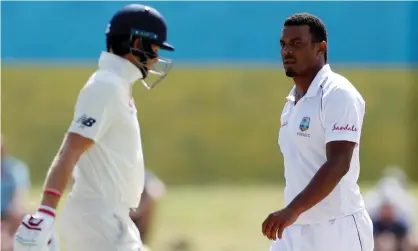  ??  ?? England’s Joe Root walks past the West Indies fast bowler Shannon Gabriel at a match in Saint Lucia. Photograph: Paul Childs/Action Images/ Reuters