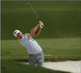  ?? CHUCK BURTON — THE ASSOCIATED PRESS ?? Kevin Kisner hits from the bunker on the third hole during the final round of the PGA Championsh­ip golf tournament at the Quail Hollow Club Sunday in Charlotte, N.C.