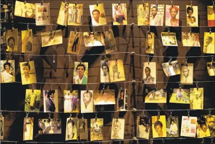  ?? PHOTOGRAPH­S Ben Curtis Associated Press ?? of some who died in Rwanda in 1994, in an exhibition at the Kigali Genocide Memorial in the nation’s capital.