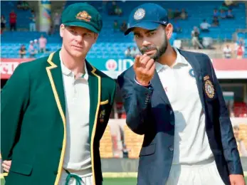  ??  ?? Steve Smith (left) of Australia and India’s Virat Kohli in this file photo.