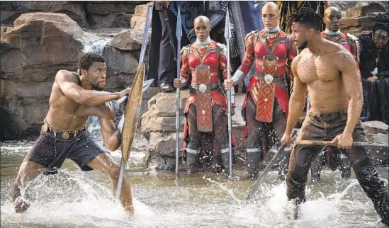  ?? Matt Kennedy Marvel Studios ?? IT’LL BE TIME for a different kind of face-off as “Black Panther” — with Chadwick Boseman, left, and Michael B. Jordan — heads toward the Oscar voting season.