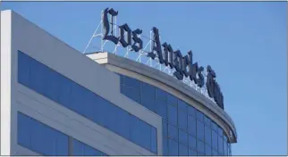  ?? THE ASSOCIATED PRESS ?? The Los Angeles Times will lay off about 115journal­ists, it said in an email to affected personnel. The newspaper’s owner says the company is losing $30 million to $40 million a year..