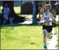  ??  ?? Scotts Valley High junior Austin George sets a fast pace during the beginning of the SCCAL Cross Country Championsh­ips at Pinto Lake County Park on Friday.