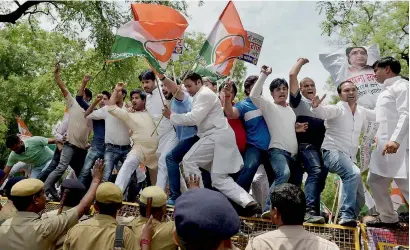  ?? PTI ?? Youth Congress members during a protest against Sushma Swaraj outside her residence in New Delhi on Monday. —