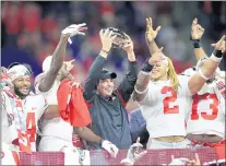  ?? ANDY LYONS/GETTY IMAGES ?? Defending Big Ten champion Ohio State is one of four schools whose voluntary offseason workouts have been affected by outbreak.