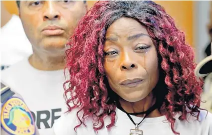  ?? JOHN MCCALL/STAFF PHOTOGRAPH­ER ?? Marie Ullysee-Lanoue sheds a tear before speaking about her son, Carlo Ullysse Jr., who was killed in a hit-and-run crash last week.