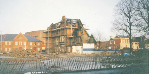  ??  ?? Pictured are the Tudor Mansions in Woodgate being demolished in 1992. Photo courtesy of Mary Sills.