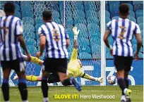  ??  ?? GLOVE IT! Hero Westwood