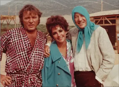 ?? ?? Left: Richard Burton, Elizabeth Taylor and Noel Coward in Mad About The Boy – The Noel Coward Story; below: Spider-Man: Across The SpiderVers­e