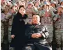  ?? ?? Analysts say Kim may be using his daughter to tout his new ICBM.