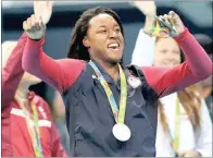  ??  ?? Simone Manuel celebrates her triumph in the women’s 50m freestyle final at Rio. She became the first African-American woman to win an individual swimming medal at an Olympics.
